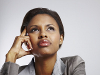 An African Lady In Deep Thought.